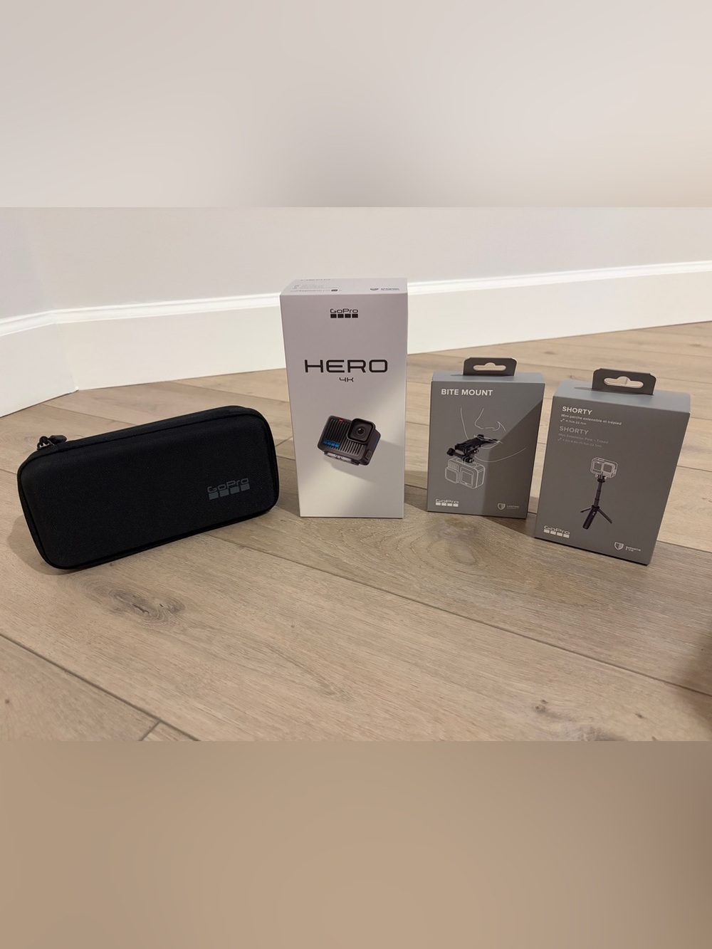 NEW NWT GoPro HERO 4K Action Camera Bundle with Case, Shorty Tripod, Bite Mount